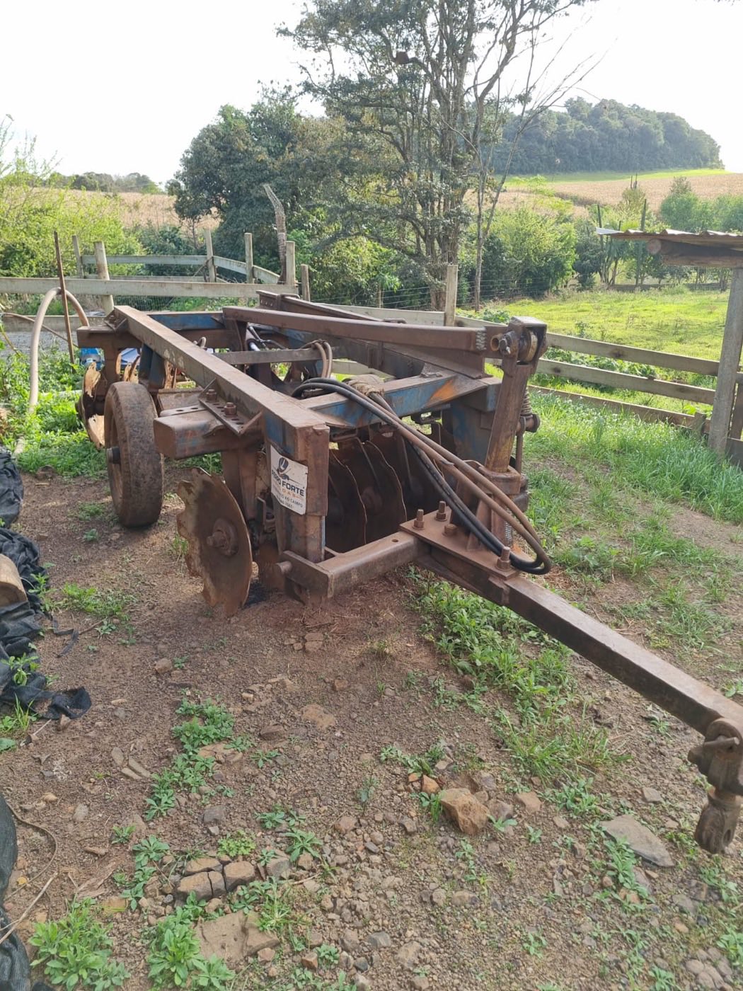 Grade aradora PICCIN 14x26 da Associação em área de lavoura